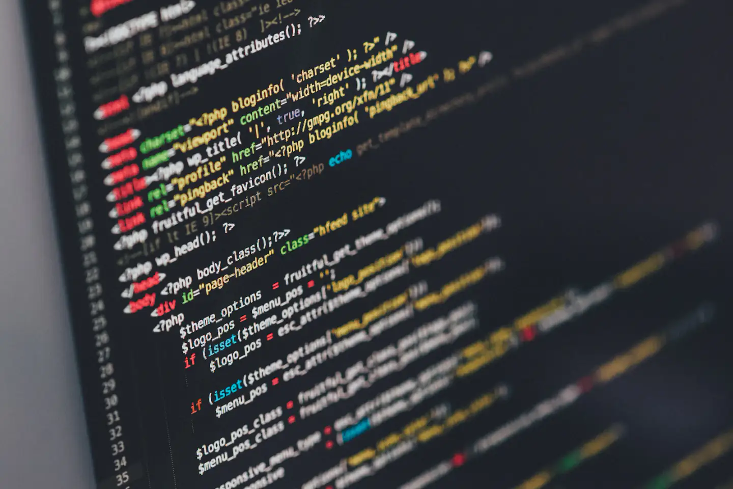 Colorful syntax-highlighted code on a monitor