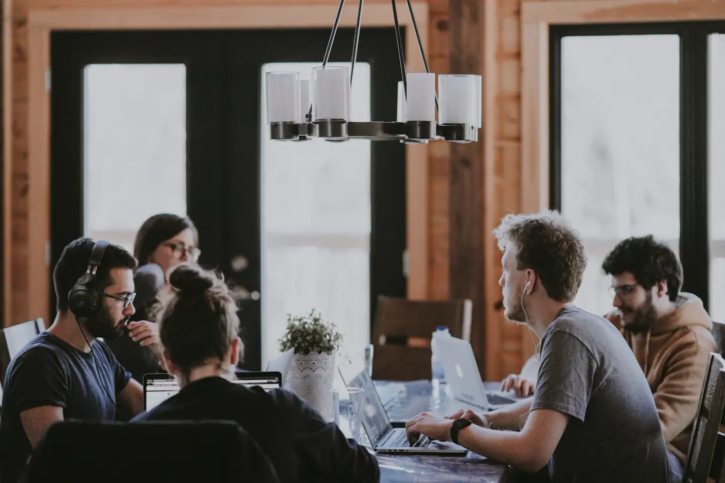 Product team collaborating around a shared table